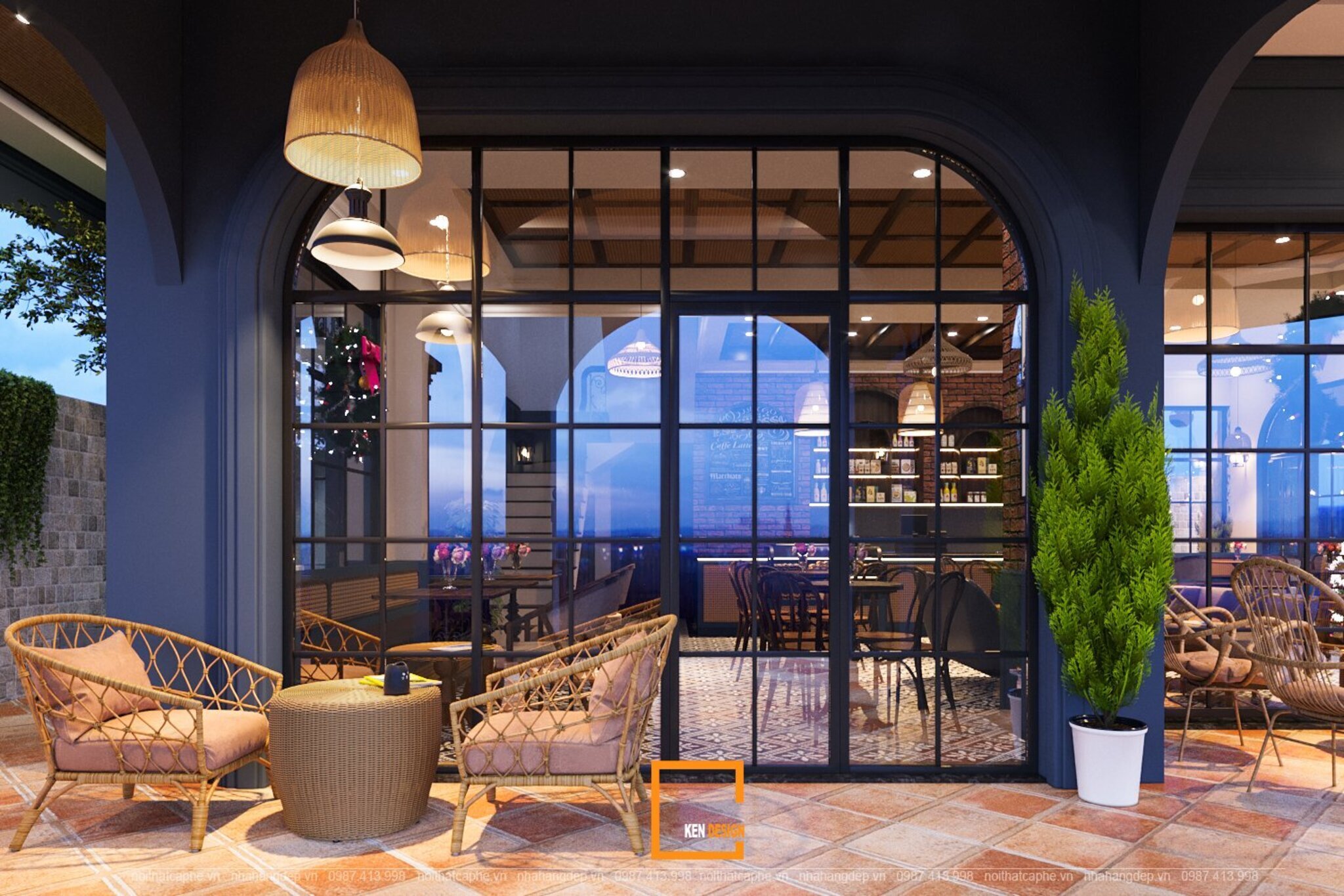 hiên quán cafe 2 mặt tiền với ghế mây và cửa kính khung đen vòm cuốn