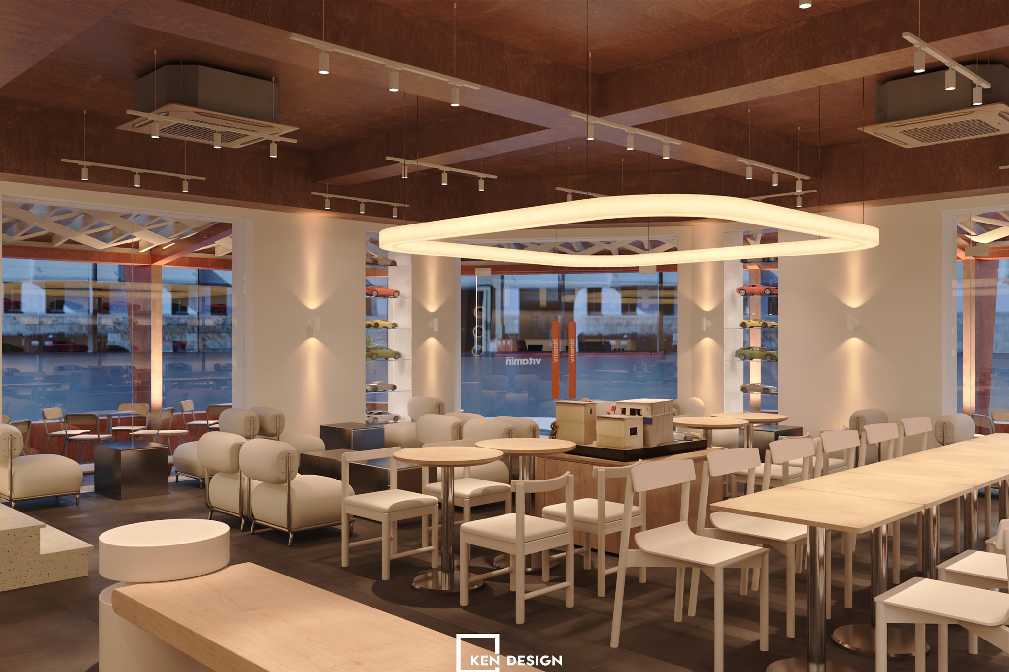 Đèn tường hắt sáng và đèn vòng lớn tạo bầu không khí ấm cho quán cafe căn góc